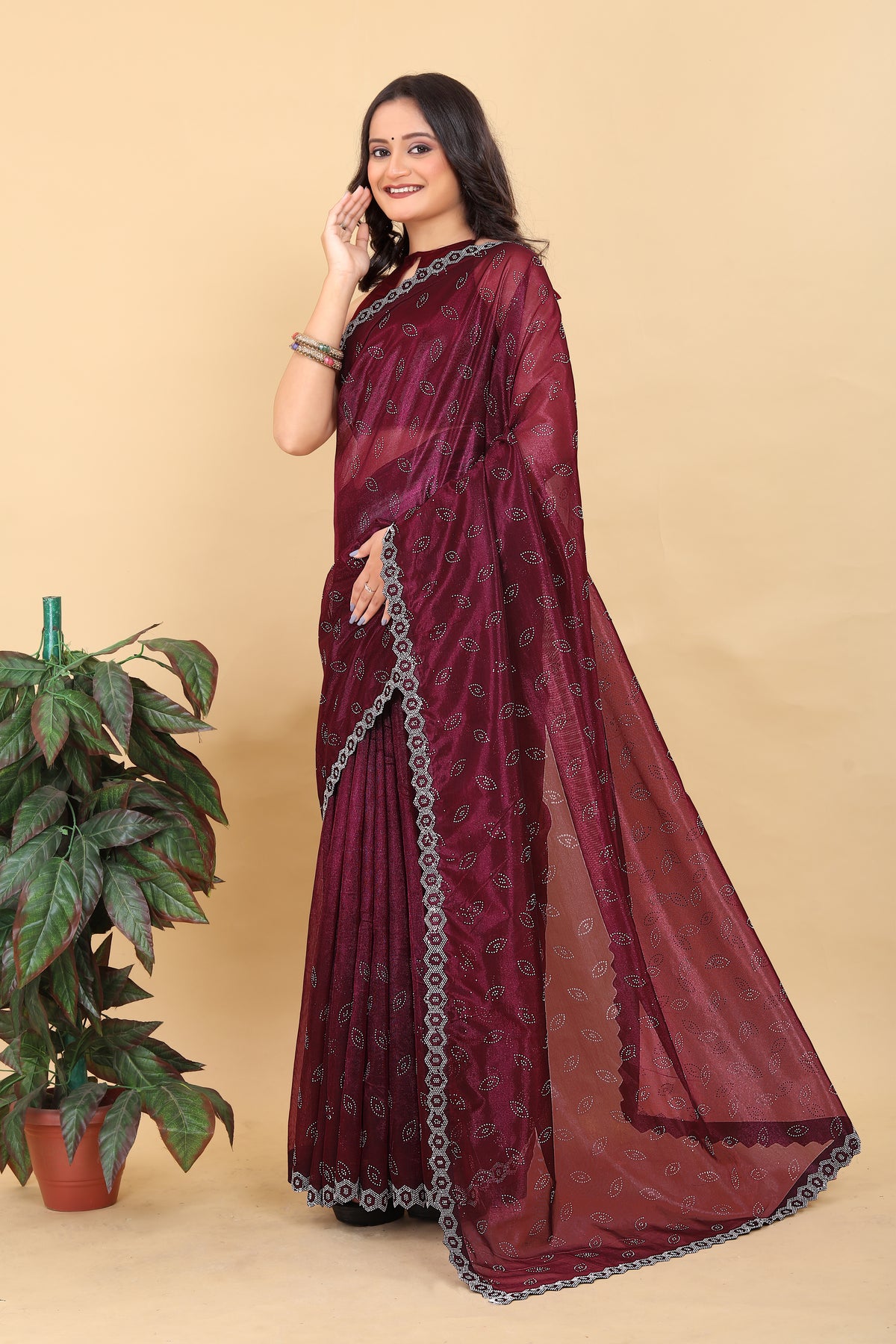 Elegant Peach Net Saree with Pink Lace Border