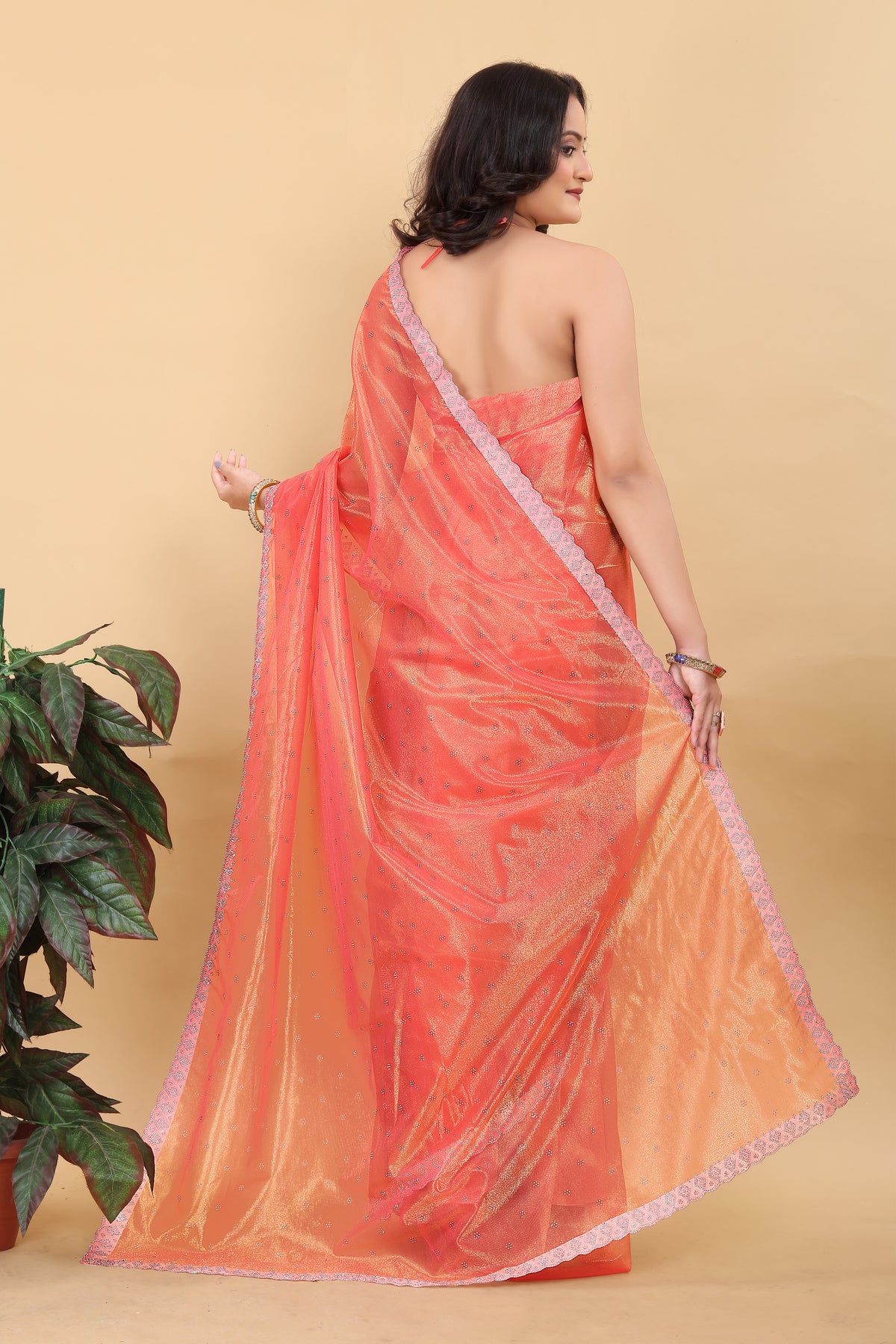 Elegant Peach Net Saree with Pink Lace Border