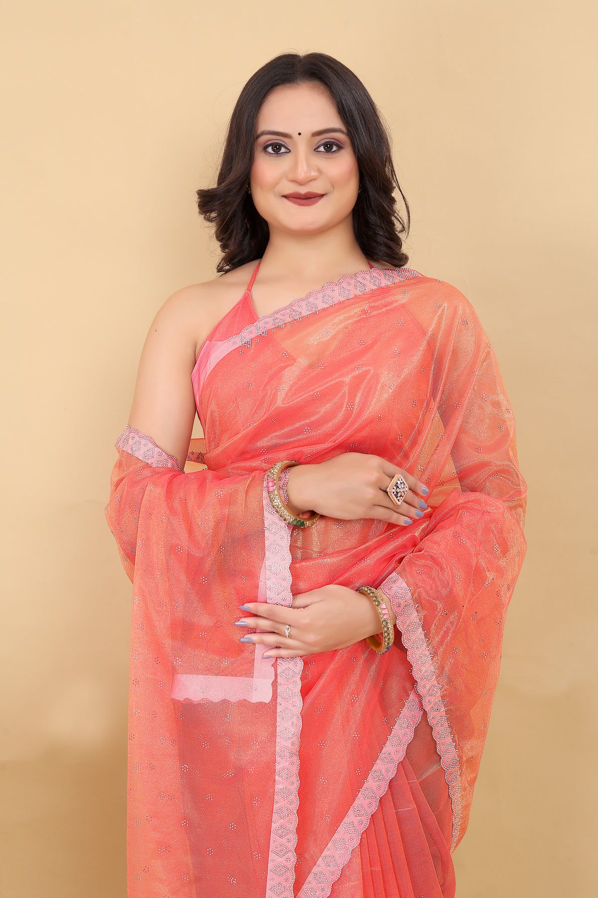 Elegant Peach Net Saree with Pink Lace Border