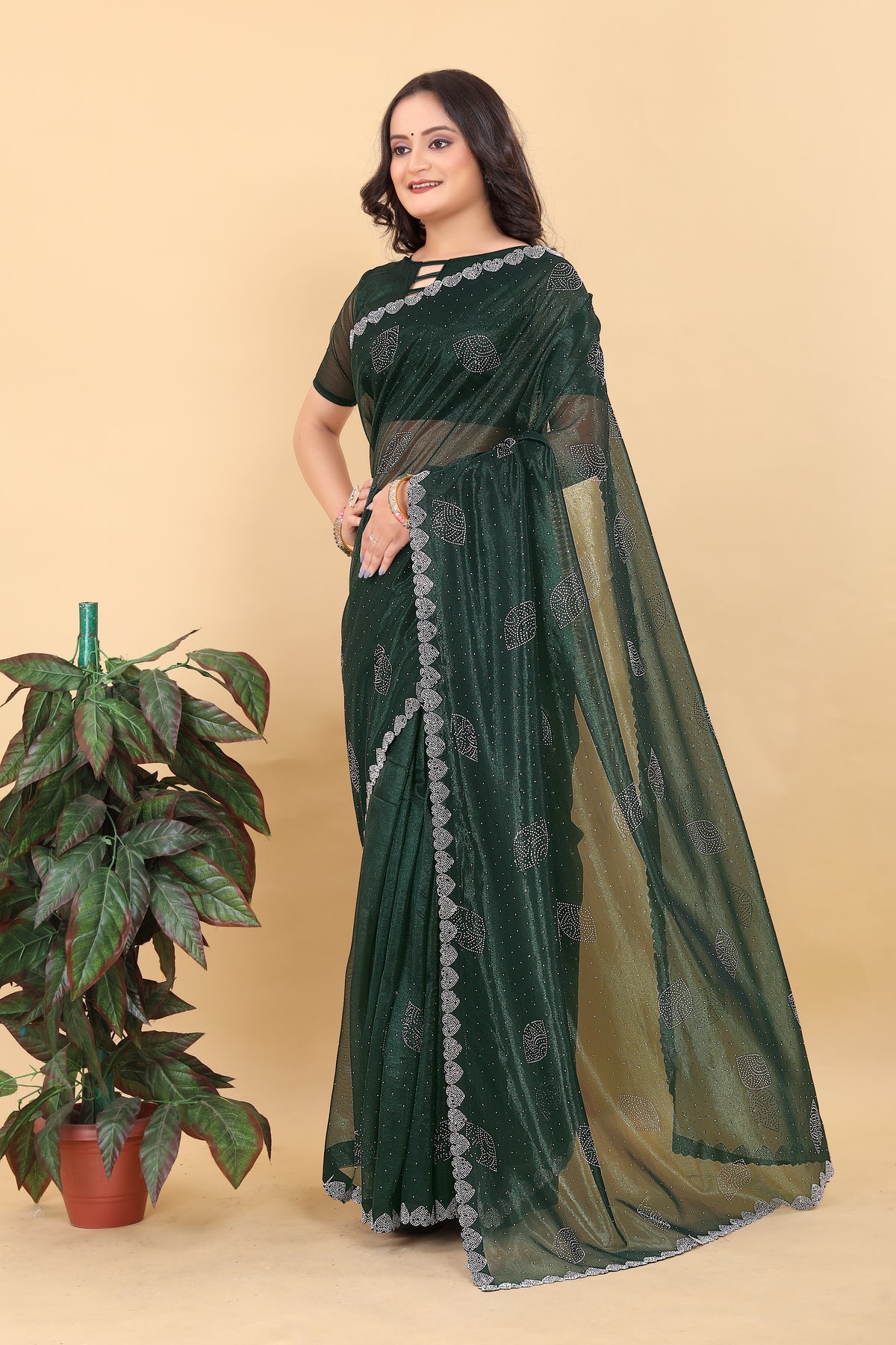 Elegant Dark Green Embroidered Saree with Net Detailing