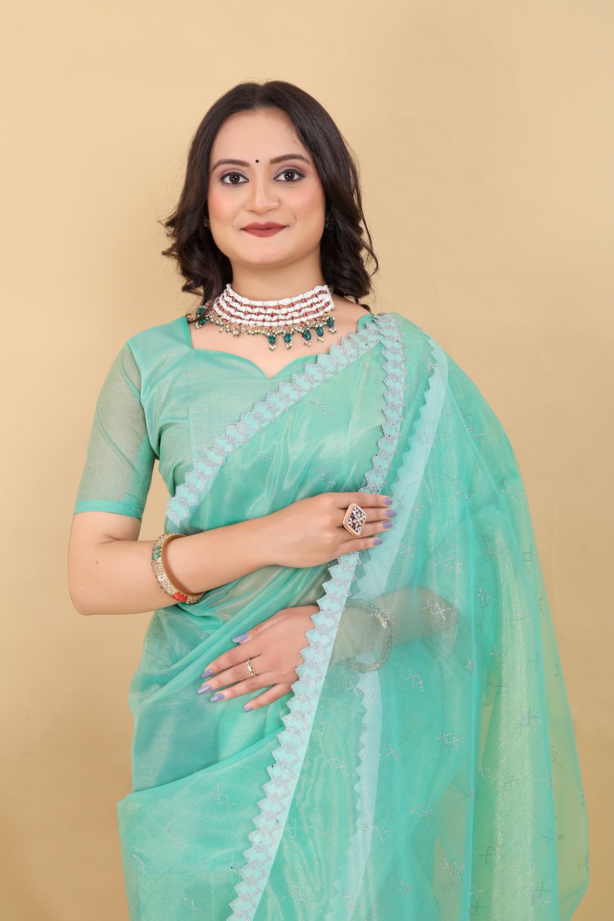 Elegant Mint Green Organza Saree with Subtle Detailing