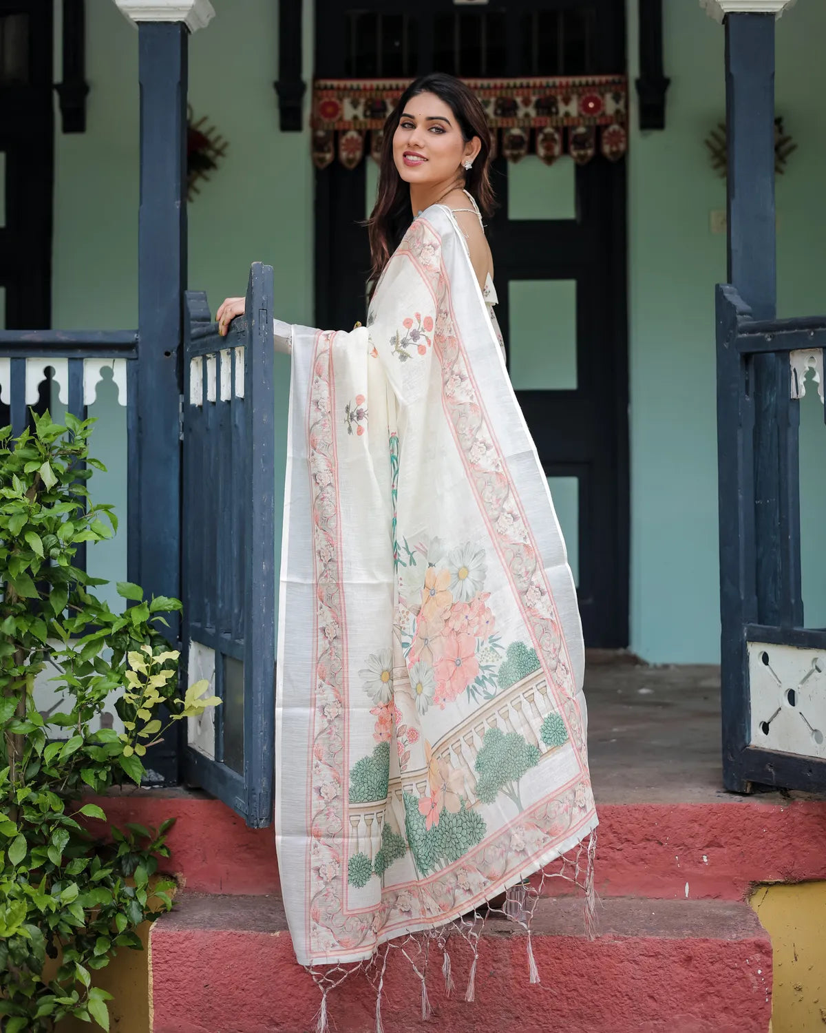 Ivory Pure Cotton Linen Saree with Pastel Floral Design And Tassel Detailing With Unstitched Blouse
